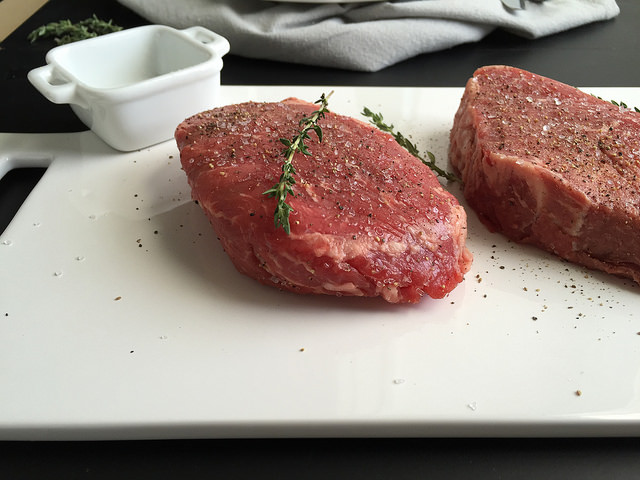Beef with Red Wine Mushroom Sauce - an easy to prepare beef recipe with restaurant quality appeal and flavor! Just sear tenderloin steaks and saute a thyme-infused mushroom sauce using a dry red wine like cabernet sauvignon