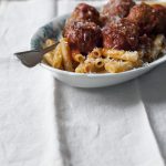 The Best Meatballs and Sauce Recipe! These meatballs are as tender as can be. Soft and seasoned with oregano and mint - the secret ingredient in my family's decades-old recipe. You'd never be able to pinpoint what that lovely flavor is, because it's not overtly minty, just subtlely fragrant and herbal. The sauce is rich, sweet, and garlicky and the meatballs are cooked right in the sauce, allowing them to retain their moisture, and giving the sauce even more flavor | andiemitchell.com