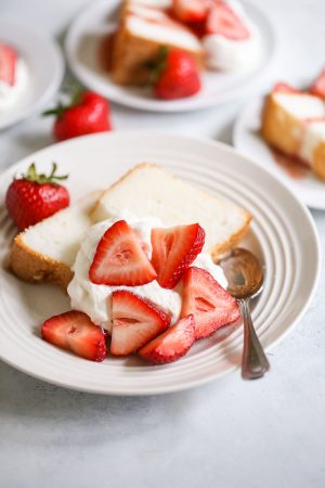 Strawberry shortcakes made with angel food cake, fresh strawberries, and whipped cream