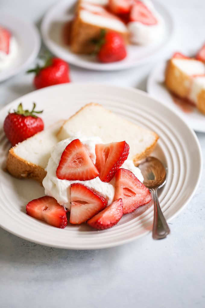 Strawberry shortcakes made with angel food cake, fresh strawberries, and whipped cream