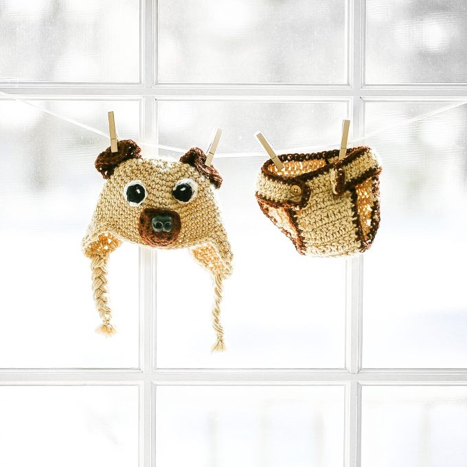 crocheted baby pug outfit