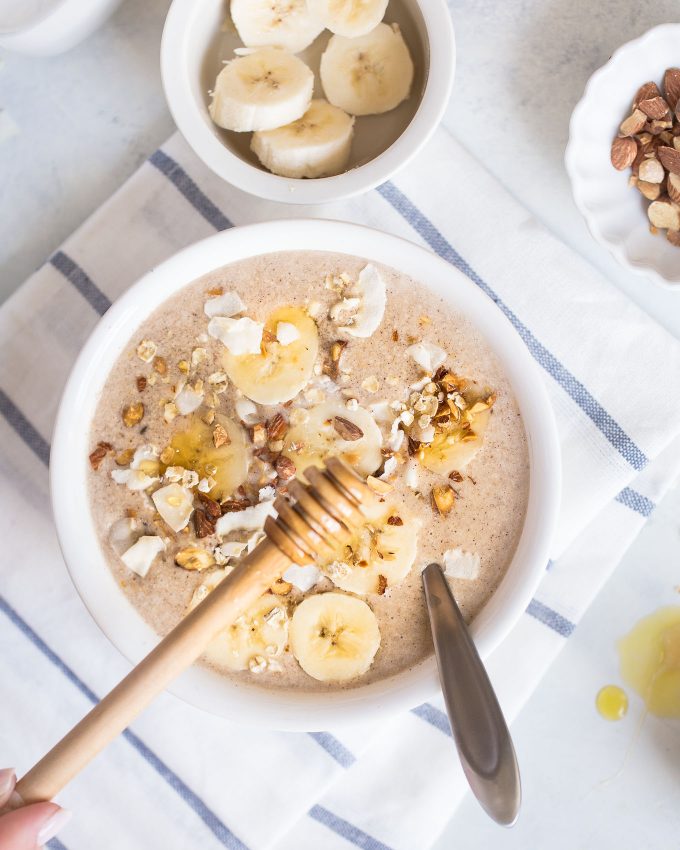Banana Bread Smoothie Bowl Recipe - made with frozen banana, almond milk, oats, almond butter, cinnamon, and vanilla extract