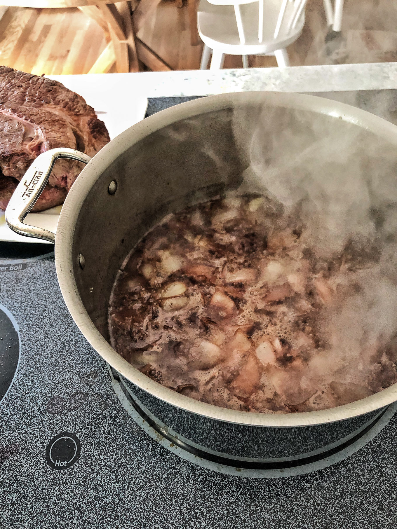 ingredients for the pot roast recipe simmering