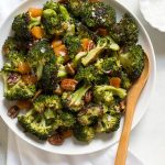 Broccoli salad with apricots and pecans is salty sweet, with roasted broccoli! This recipe is quick and easy to make, has only 5 ingredients, and is great as a potluck side dish.