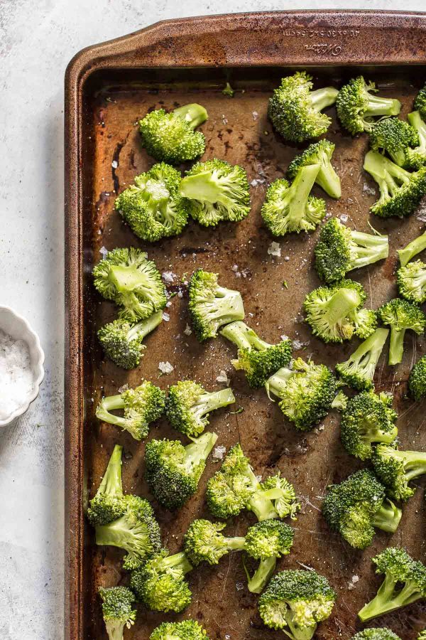 Broccoli salad with apricots and pecans is salty sweet, with roasted broccoli! This recipe is quick and easy to make, has only 5 ingredients, and is great as a potluck side dish. 