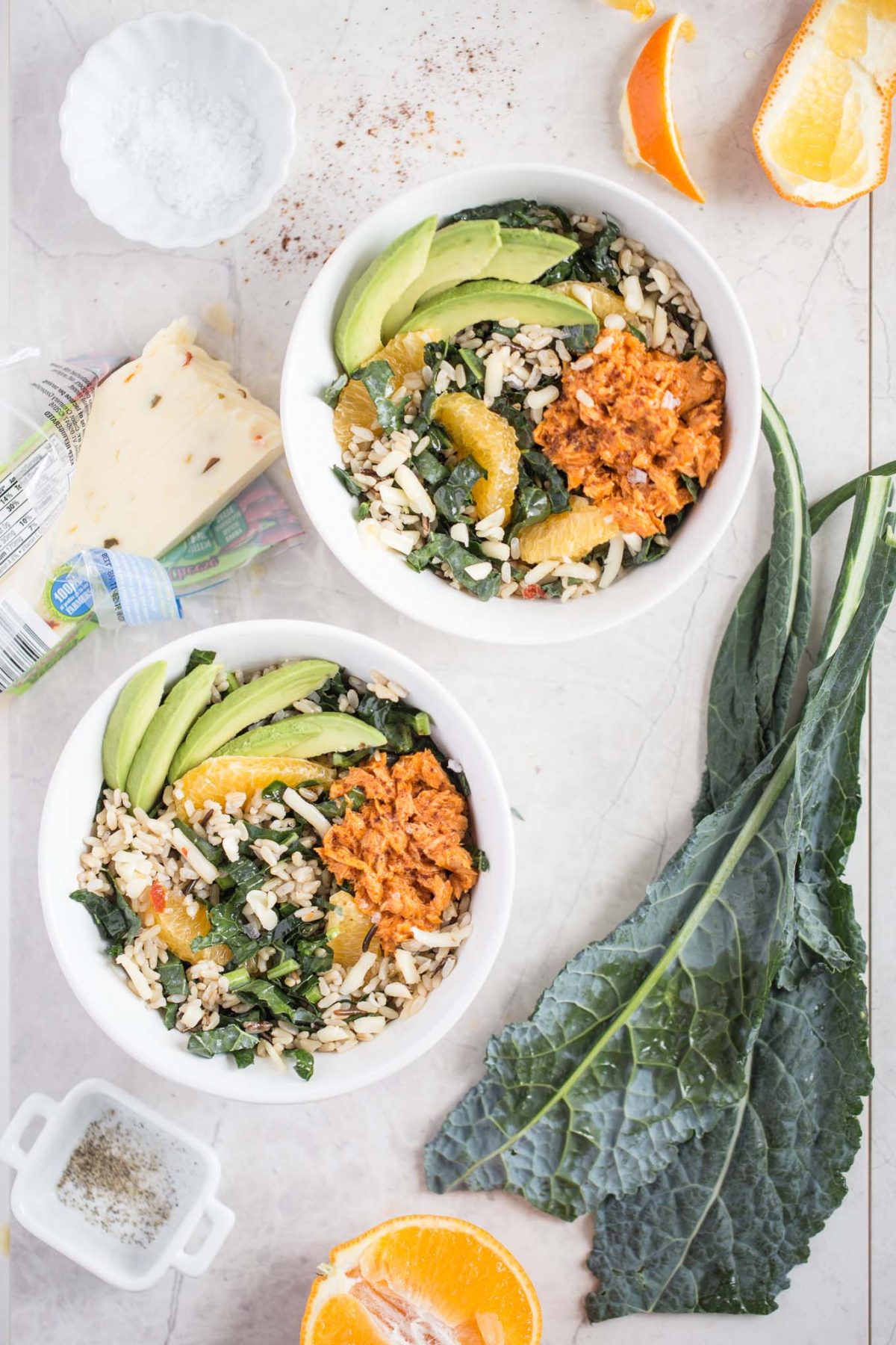 Brown and Wild Rice Bowl with Salmon, Orange and Avocado - This brown and wild rice bowl is easy, convenient, and quick! Use Chicken of the Sea Barbecue Flavored Salmon Pouches (or canned salmon!), Minute Ready to Serve Whole Grain Brown and Wild rice, orange, kale, avocado, and pepper jack cheese! 