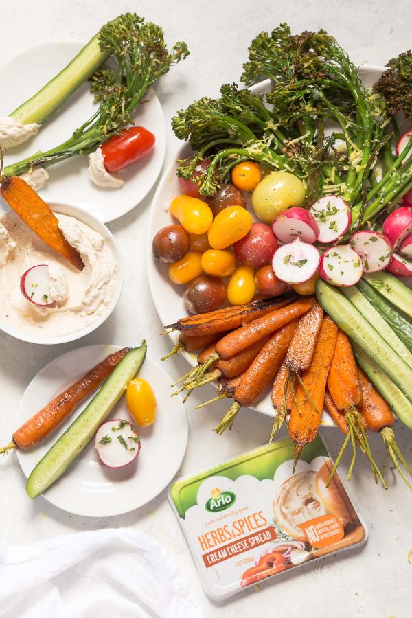 How to make a better vegetable platter with recipes for tandoori spice carrots, lemon broccolini, radishes, cucumbers, tomatoes - any seasonal veggies - and an easy cream cheese to dip! 