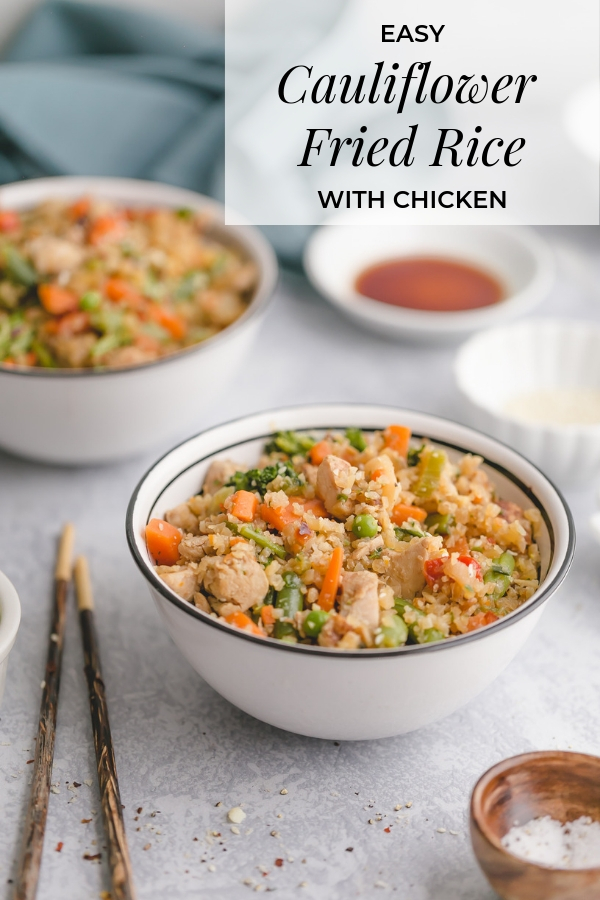 Cauliflower Fried Rice with Chicken! The best recipe for cauliflower fried rice with chicken and frozen cauliflower rice. All you need is boneless, skinless chicken breast, garlic, ginger, soy sauce, toasted sesame oil, and frozen peas and carrots.