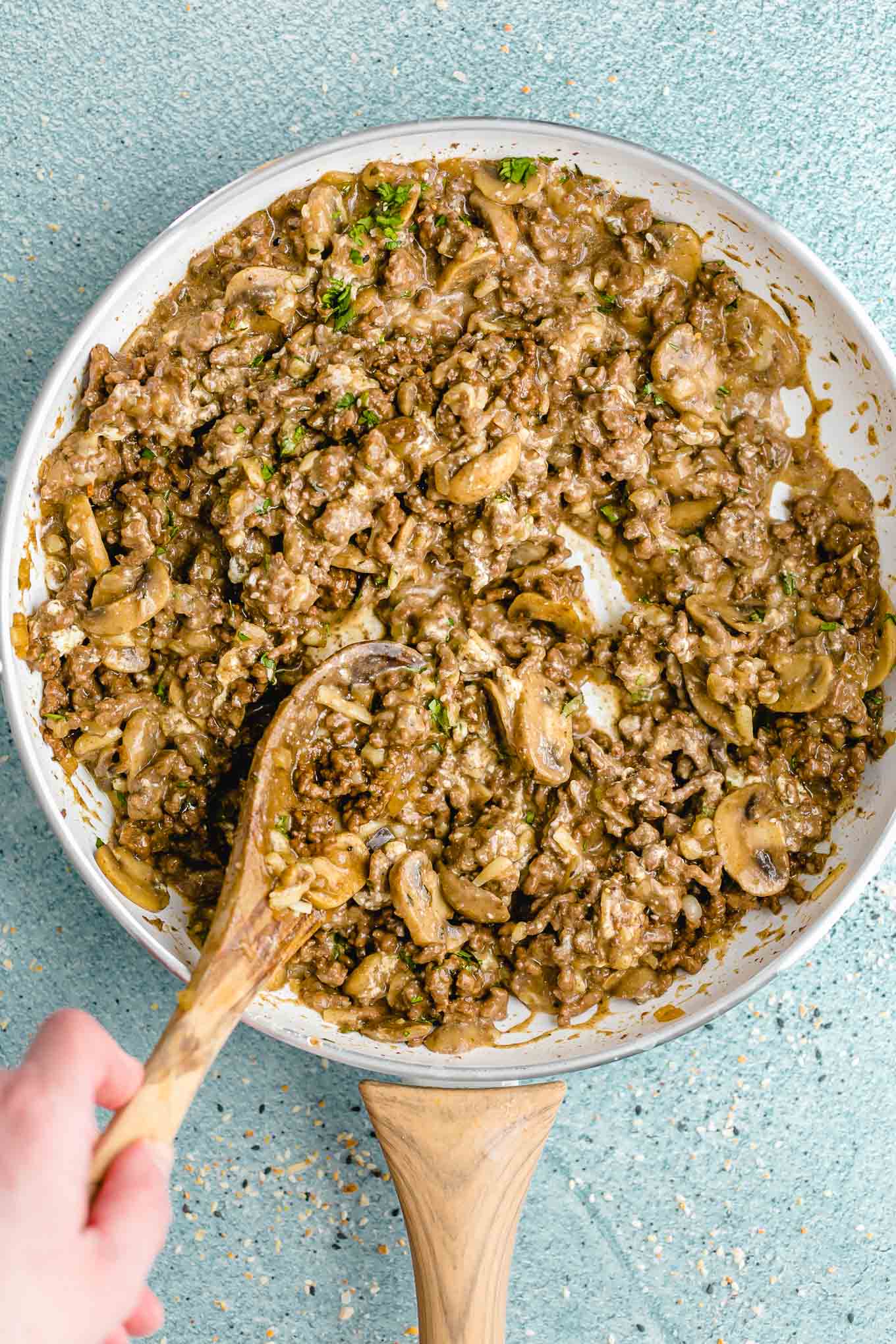 Creamy Cheeseburger Skillet with Mushrooms and Swiss! A deliciously creamy, cheesy, fully-loaded cheeseburger skillet that the whole family will love. Make it in just 30 minutes with ground beef, mushrooms, onions, cream cheese, and Swiss cheese. 