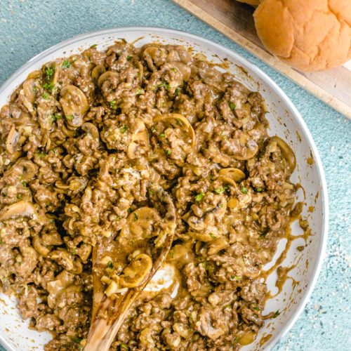 Creamy Cheeseburger Skillet with Mushrooms and Swiss! A deliciously creamy, cheesy, fully-loaded cheeseburger skillet that the whole family will love. Make it in just 30 minutes with ground beef, mushrooms, onions, cream cheese, and Swiss cheese.
