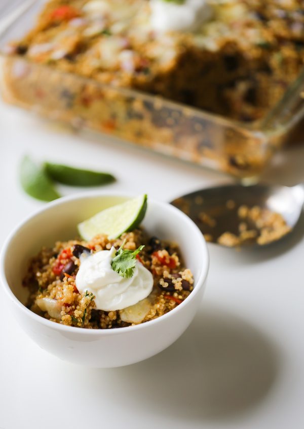 Cheesy Mexican Quinoa and Black Bean Casserole - This easy casserole recipe is vegetarian, SATISFYING, and healthy! It can be made in 1 pan in no time, too! 343 calories per bowl