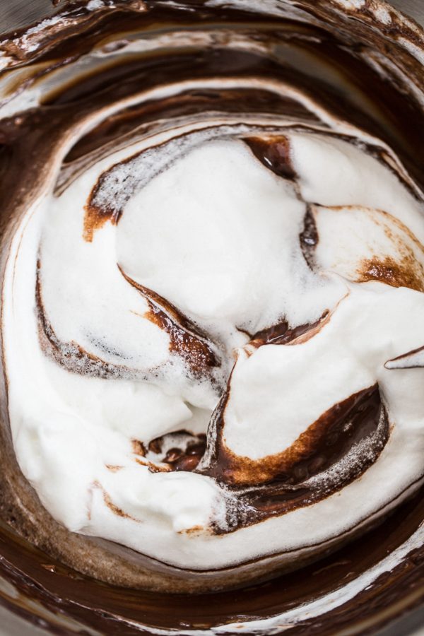 Chocolate Souffle with White Chocolate Sauce - love souffle? Here's a way to enjoy the rich, decadent chocolate dessert in individual servings for half the fuss and only 253 calories! Drizzle with white chocolate sauce and it's a quick dinner party dessert or dessert for one, two, or just a few! #healthy #treat