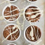Chocolate Souffle with White Chocolate Sauce - love souffle? Here's a way to enjoy the rich, decadent chocolate dessert in individual servings for half the fuss and only 253 calories! Drizzle with white chocolate sauce and it's a quick dinner party dessert or dessert for one, two, or just a few! #healthy #treat