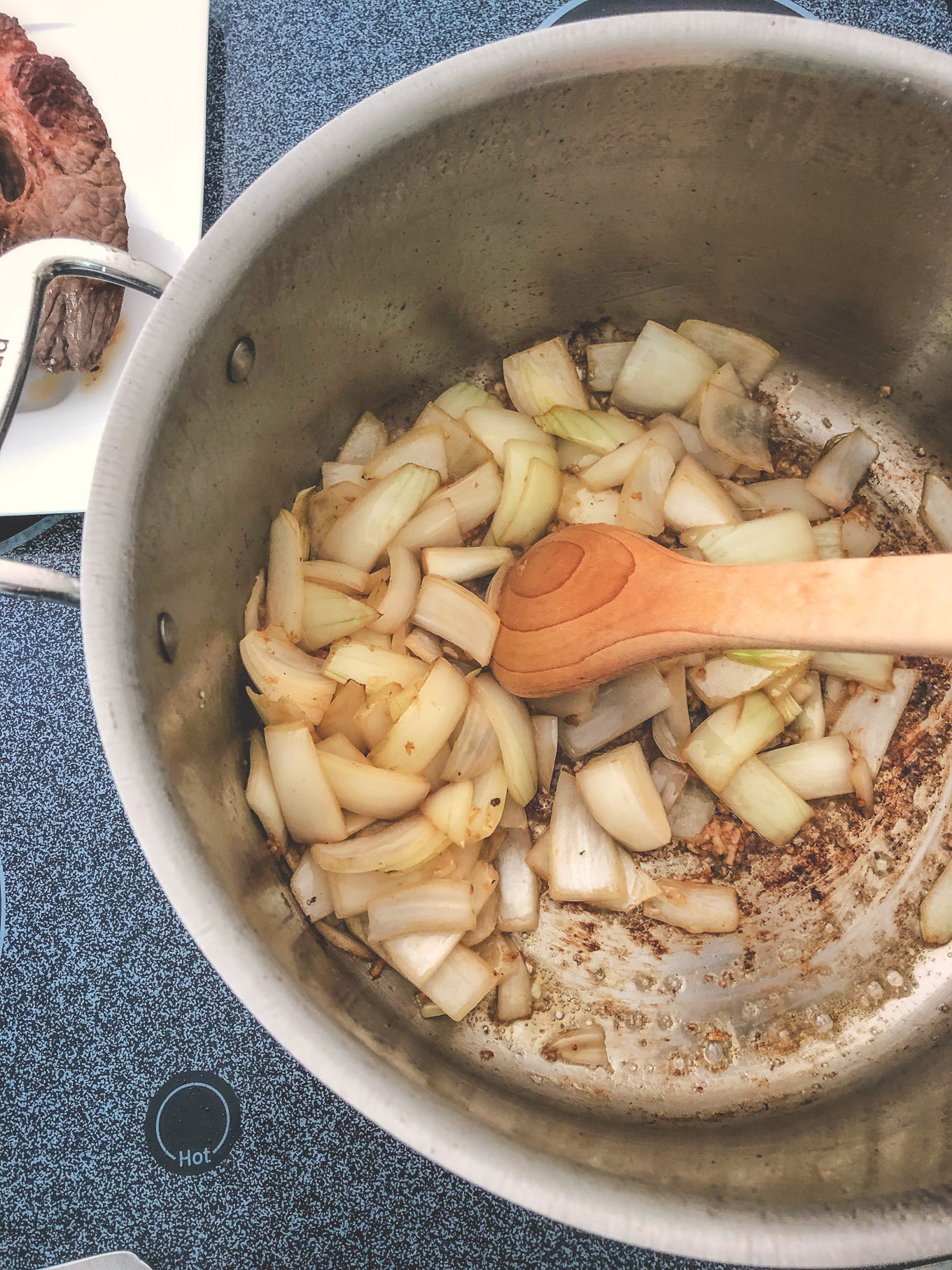 shot of onions in a pot for the pot roast recipe