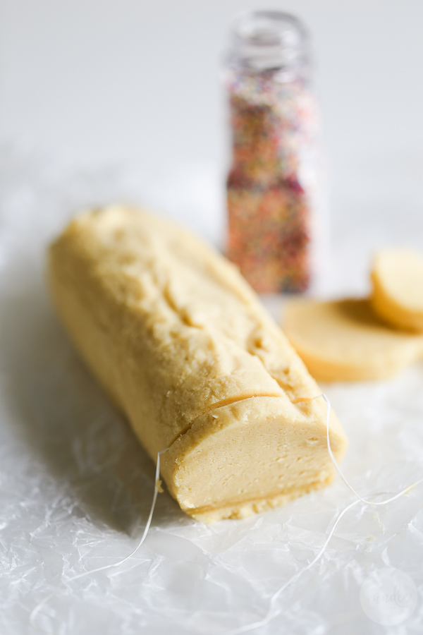 Easy Slice and Bake Sugar Cookie Recipe - these sugar cookies are so easy to make and only 77 calories each! Make the dough, form it into a log, wrap it in wax paper, and freeze - voila! Homemade slice and bake cookies!