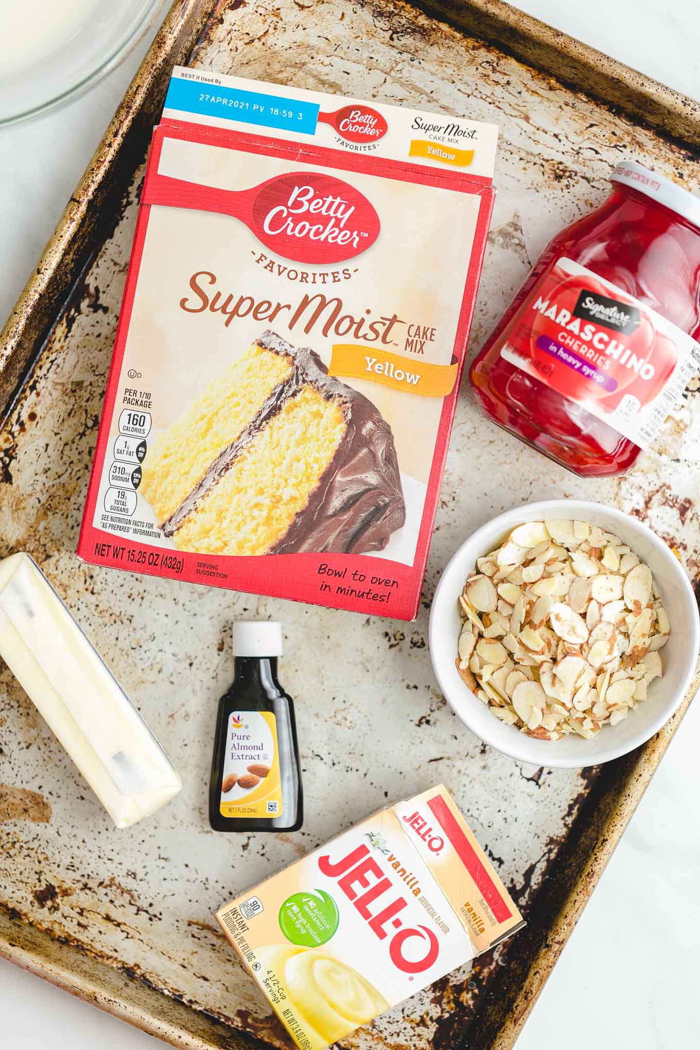 Ingredients for easy bundt cake recipe with cherries and almonds