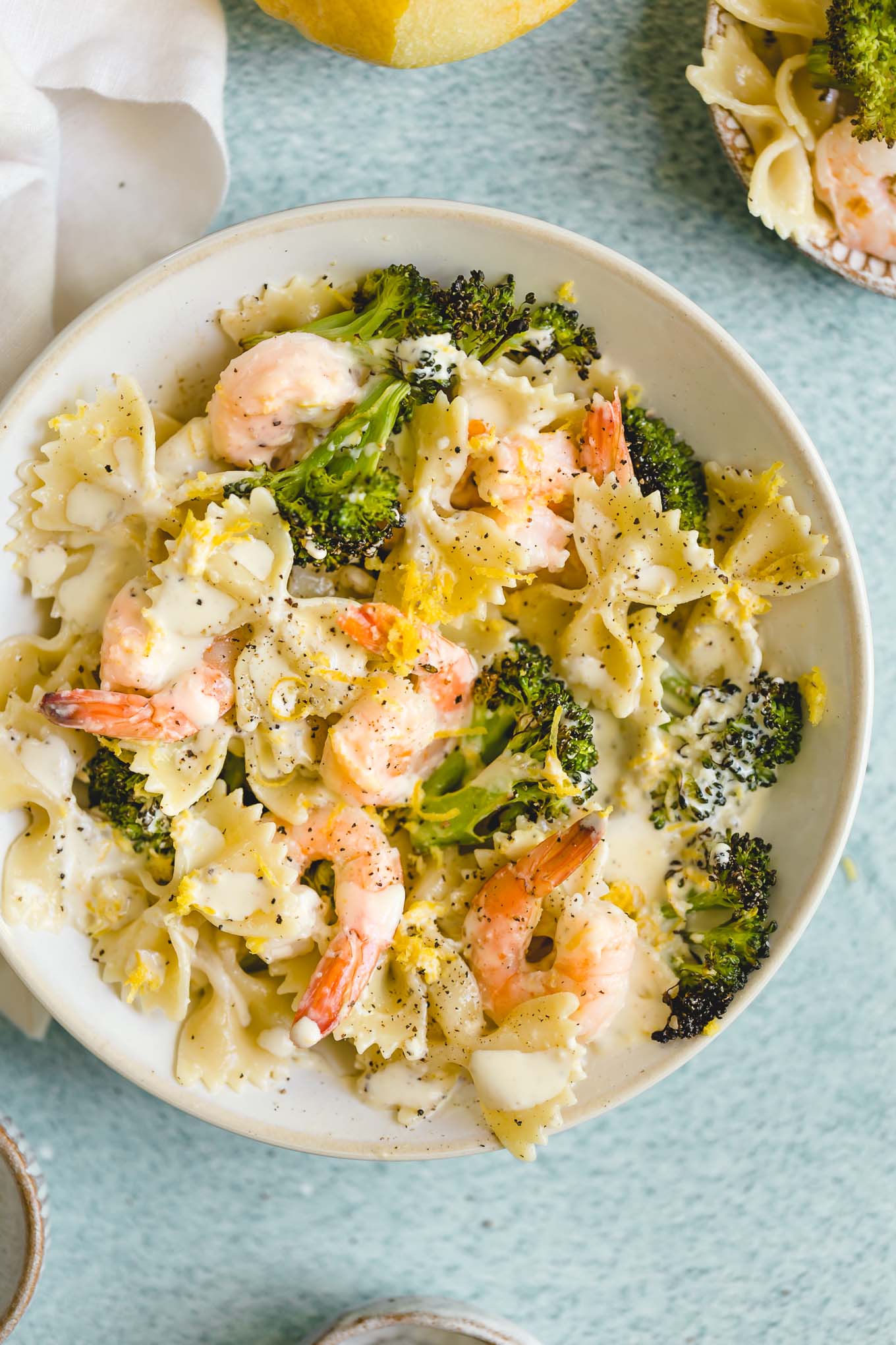easy pasta recipe with shrimp and broccoli in a creamy lemon dressing