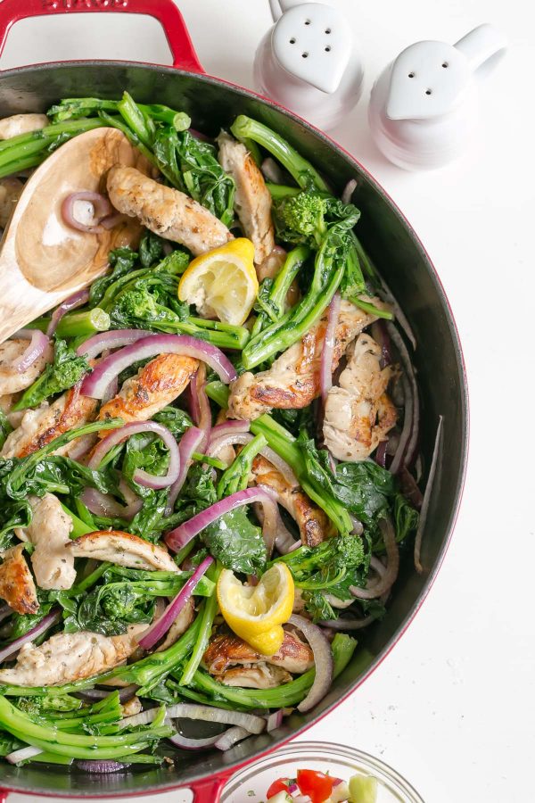 Greek chicken fajitas with broccoli rabe and fresh flavors like lemon, oregano, feta cheese, parsley, and mint. Try this easy weeknight recipe for a Mediterranean spin on traditional fajitas! #broccolirabe