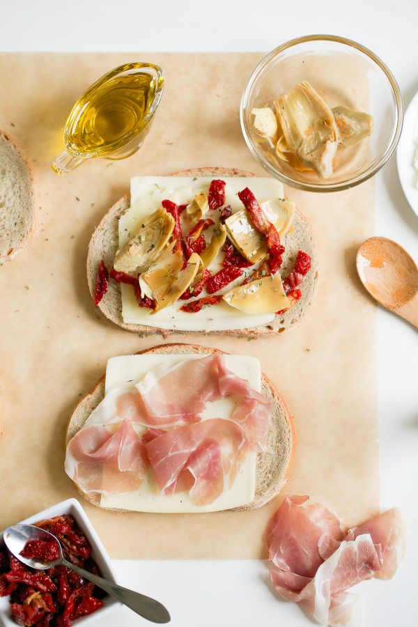 Grilled Cheese with Havarti Sun Dried Tomatoes Prosciutto and Artichokes! This Italian-style grilled cheese sandwich recipe is PACKED with flavor and delicious melty Arla Havarti cheese 