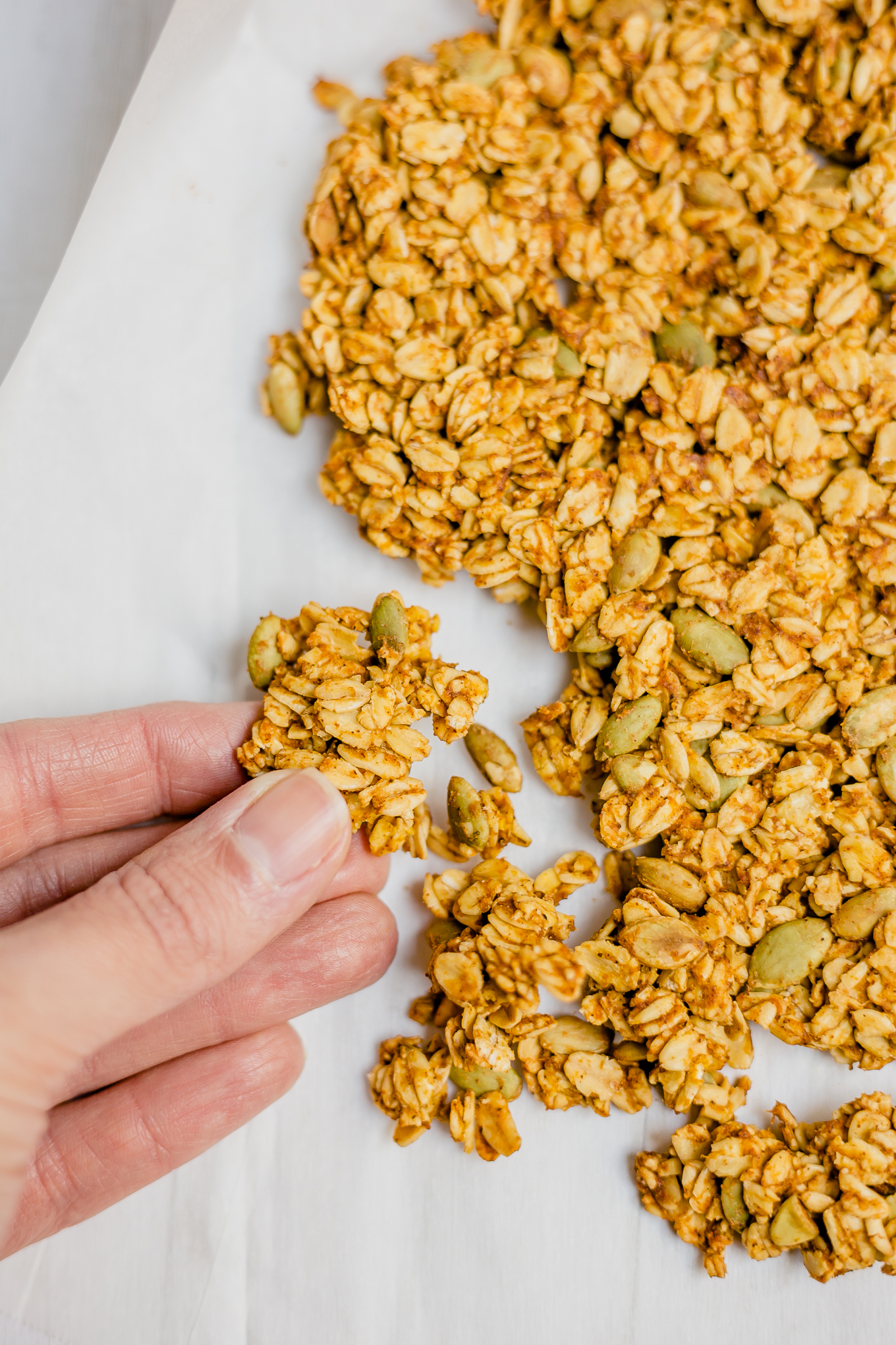 overhead shot of granola on a baking tray