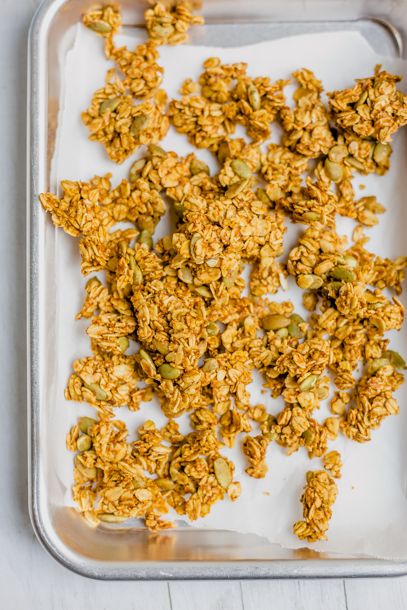 top down shot of easy granola on a baking tray