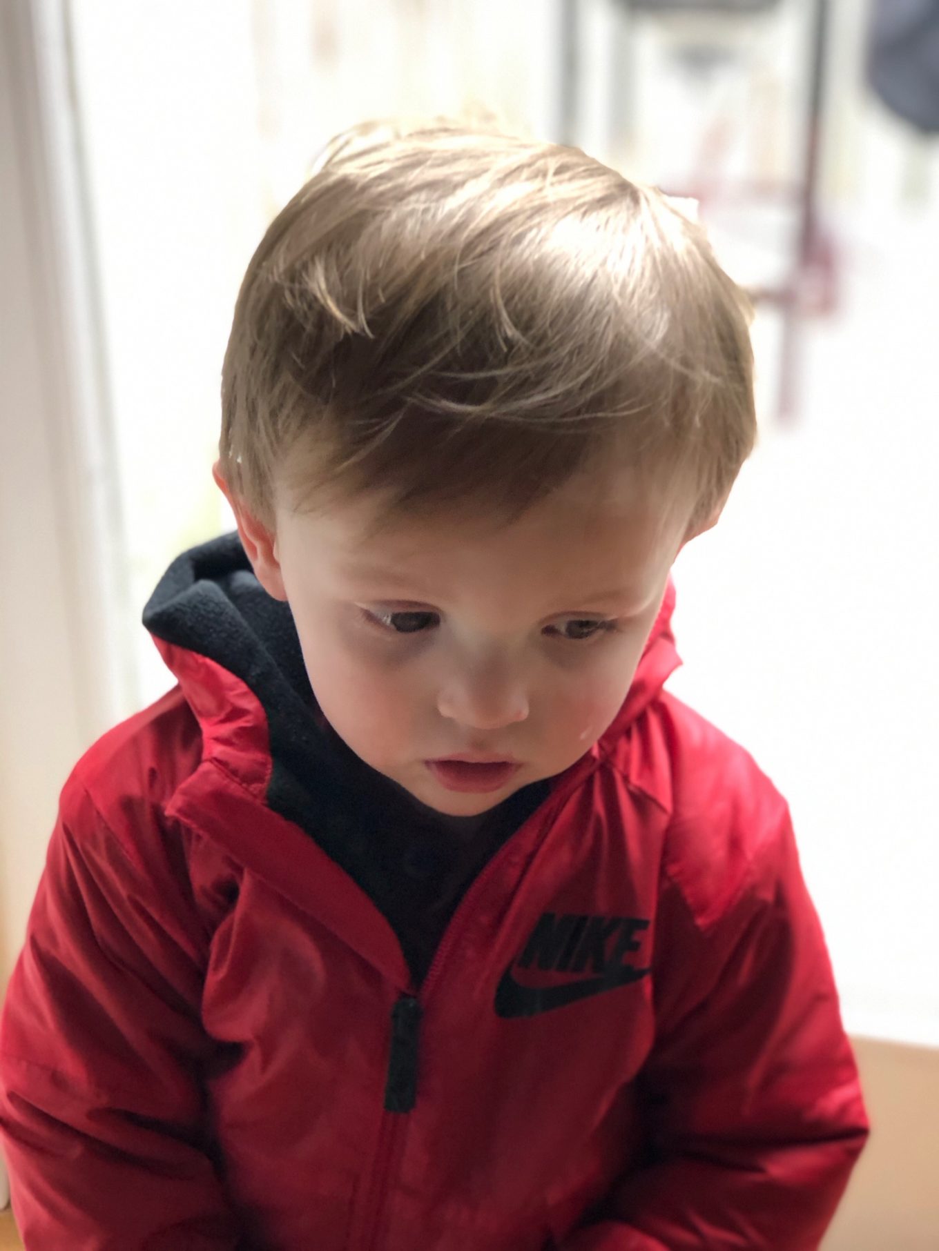 james waiting to go outside in the rain