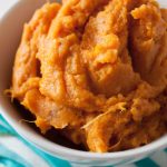 Perfect Mashed Sweet Potatoes Recipe! Add a little cinnamon, ginger, and nutmeg, and prepare to have the best side dish! The recipe can easily be made vegan with coconut oil and unsweetened almond milk. 152 calories per serving! #sidedish #sides #healthy