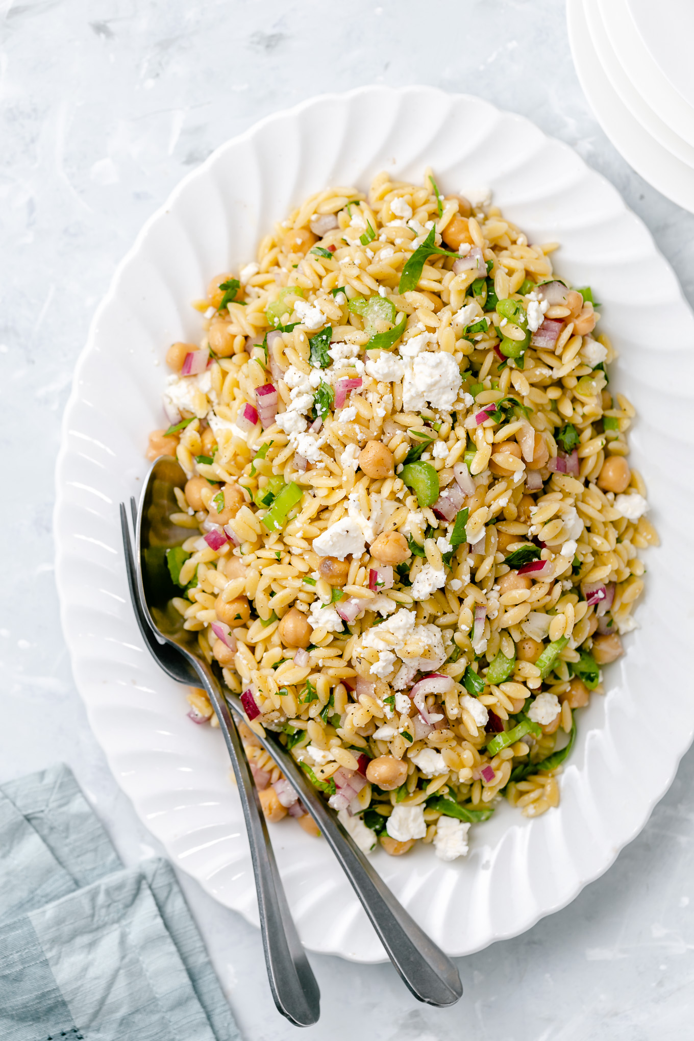 Minted Orzo Salad Recipe with Chickpeas and Feta Cheese - this deliciously easy vegetarian side dish is my most requested! It's loaded with fresh flavor from herbs and a bright lemon vinaigrette and it tastes amazing hot or cold so feel free to make ahead of time!