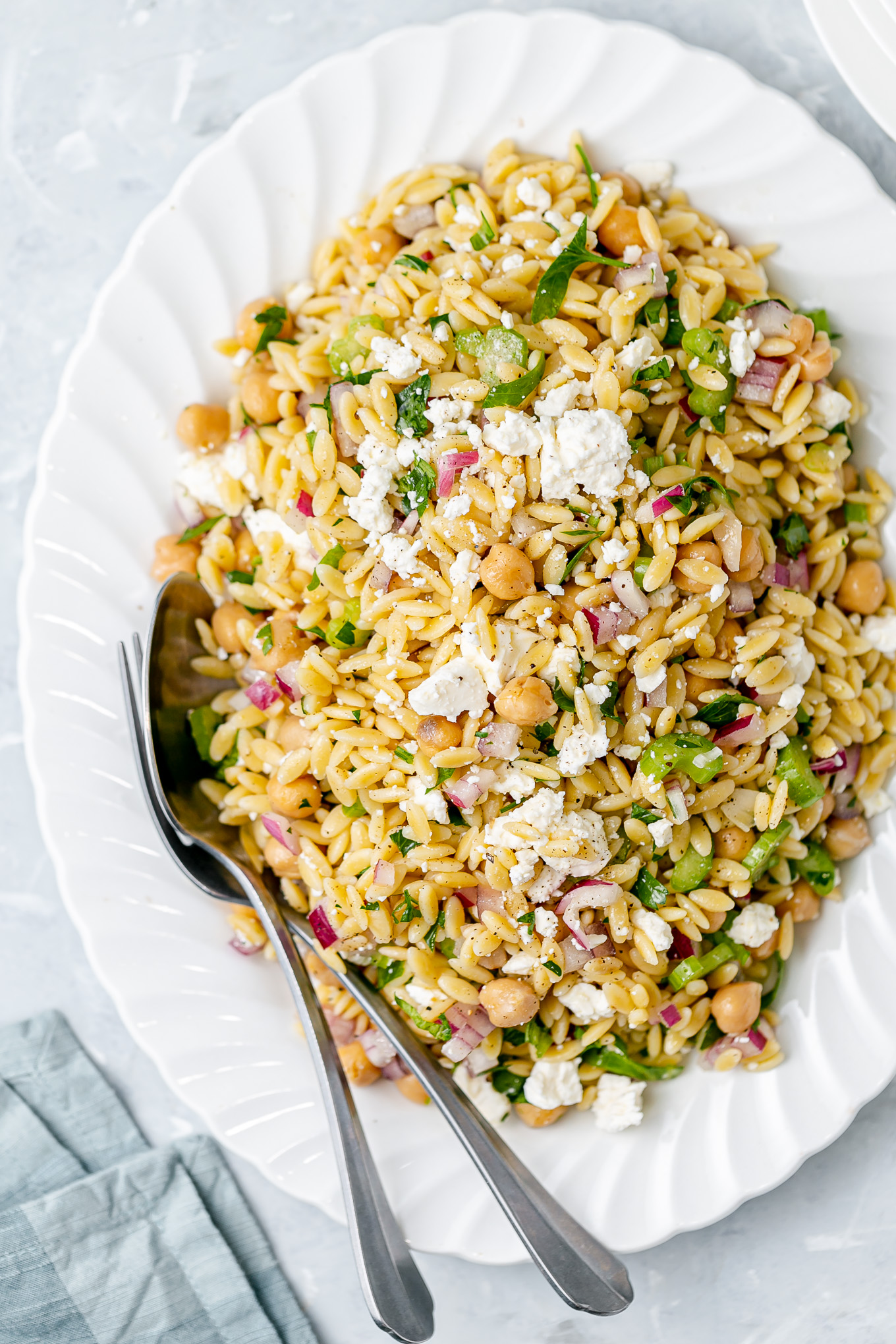 Minted Orzo Salad Recipe with Chickpeas and Feta Cheese - this deliciously easy vegetarian side dish is my most requested! It's loaded with fresh flavor from herbs and a bright lemon vinaigrette and it tastes amazing hot or cold so feel free to make ahead of time!
