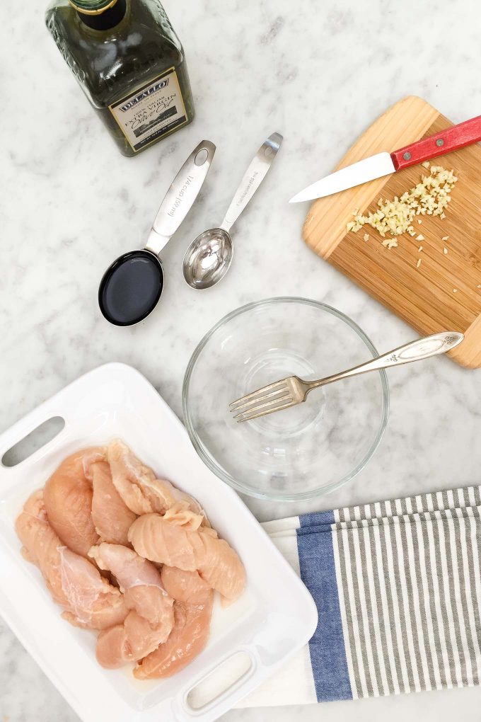 One Pan Rosemary Chicken with Penne and Vodka Sauce - this recipe is made all in one pan with whole wheat penne, broth, and a jar of DeLallo Creamy Vodka Sauce! 
