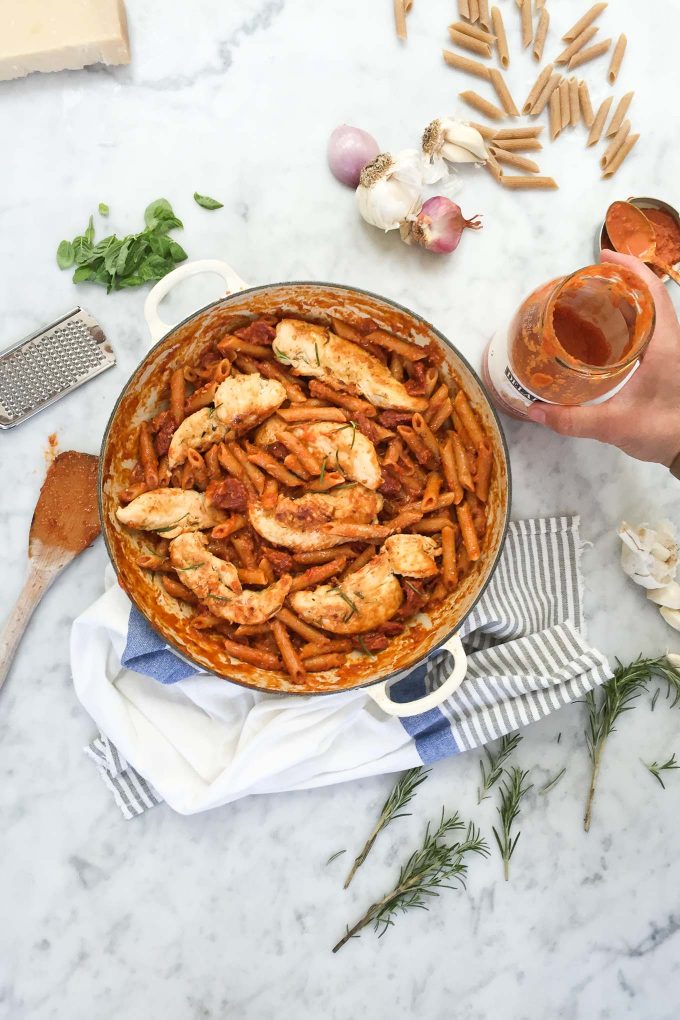 One Pan Rosemary Chicken with Penne and Vodka Sauce - this recipe is made all in one pan with whole wheat penne, broth, and a jar of DeLallo Creamy Vodka Sauce! 