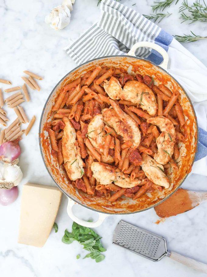 One Pan Rosemary Chicken with Penne and Vodka Sauce - this recipe is made all in one pan with whole wheat penne, broth, and a jar of DeLallo Creamy Vodka Sauce! 