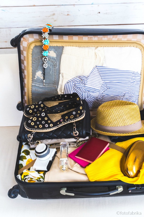 Packed suitcase - photo copyright fotofabrika
