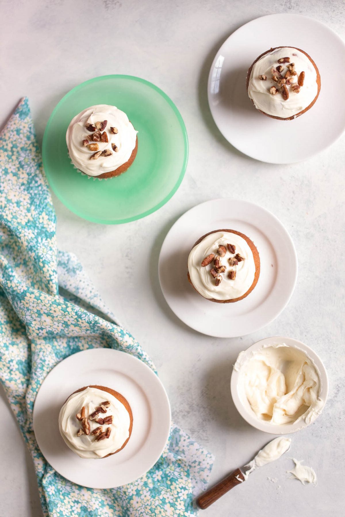 Naturally Sweetened Pumpkin Cupcakes with Maple Cream Cheese Frosting - made with no refined sugar! These are naturally sweetened with medjool date paste!