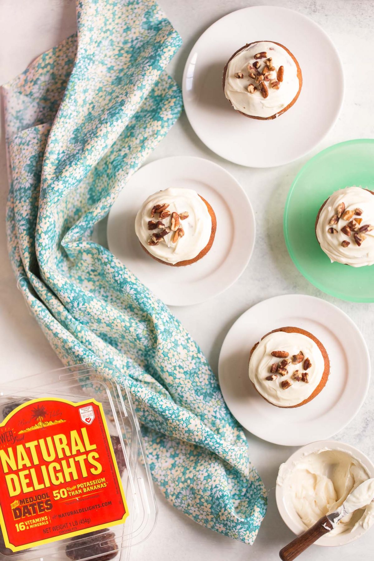 Naturally Sweetened Pumpkin Cupcakes with Maple Cream Cheese Frosting - made with no refined sugar! These are naturally sweetened with medjool date paste!