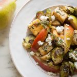 Rosemary Sage Tofu with Roasted Brussels Sprouts, Pear, and Goat Cheese - This healthy vegetarian salad recipe is perfect for fall and any holiday table!