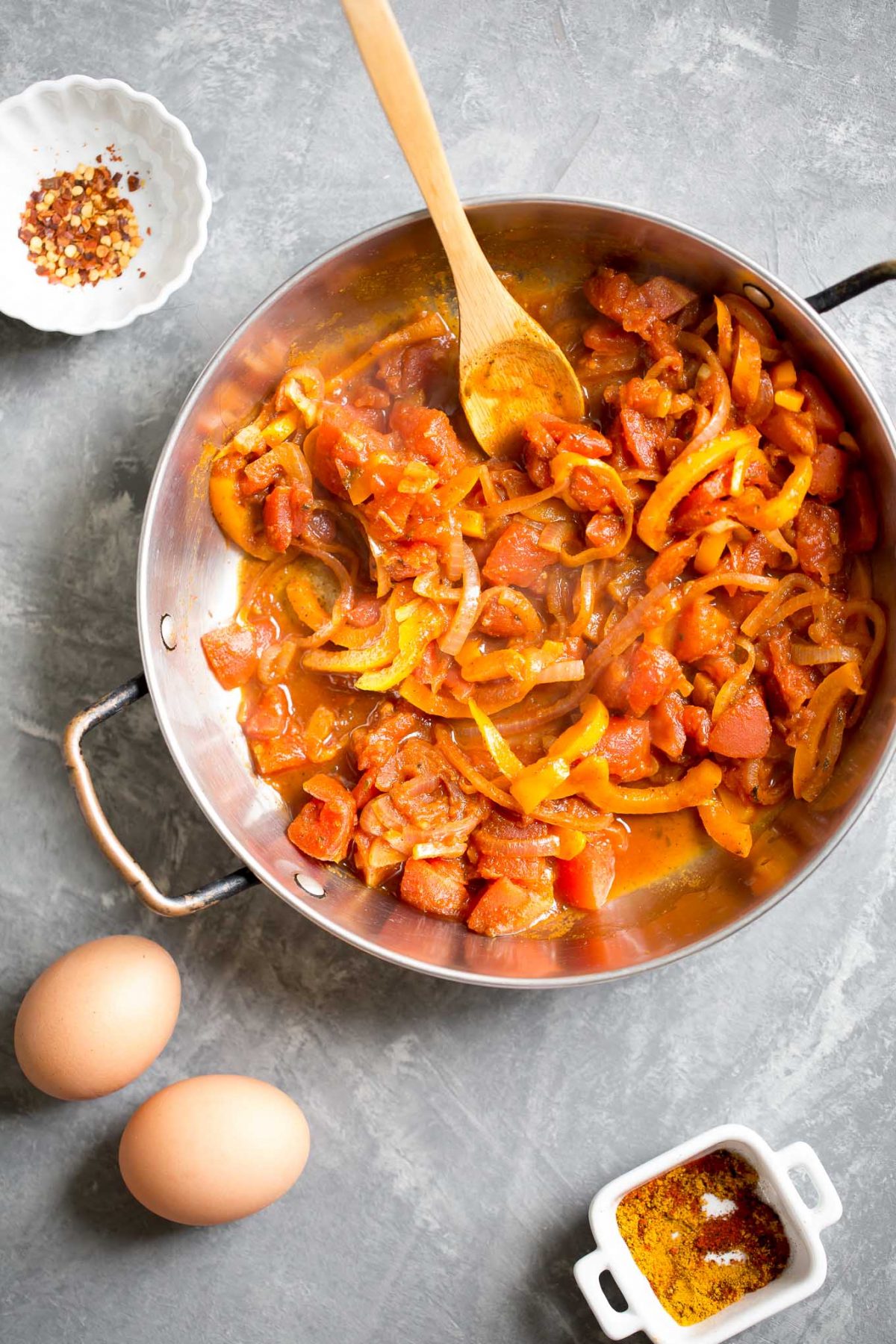 Easy Shakshuka Recipe - an easy and healthy breakfast of eggs simmered in a rich Moroccan spiced tomato sauce! 