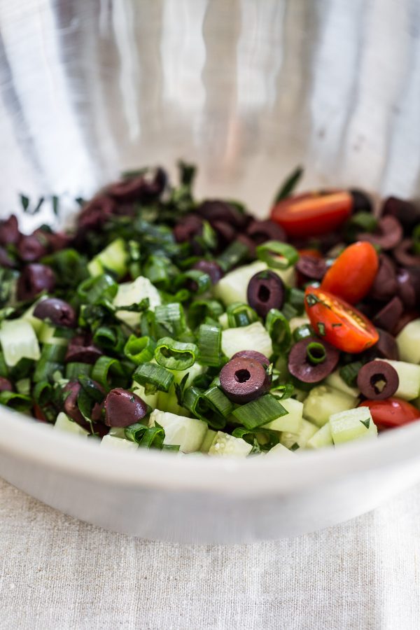 Quinoa Salad with Shrimp, Feta, Tomatoes, and Olives! This recipe is quick to make, refreshing, so light, and perfect to make ahead for lunch or even a party! It's one of those healthy salad recipes that can be served hot or cold!