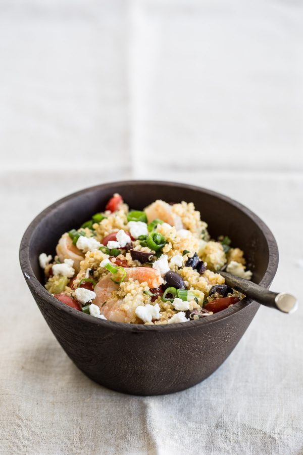 Quinoa Salad with Shrimp, Goat Cheese and Olives! This quick recipe is refreshingly light, healthy, and perfect to make ahead for lunch during the week, or even to bring to a party! It's one of those healthy - hearty salad recipes that can be served hot or cold!