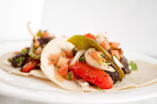 Slow Cooker Steak Fajitas Recipe - this crock pot favorite produces beef fajitas that are fall-apart tender and packed with Mexican flavor!