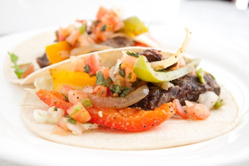Slow Cooker Steak Fajitas Recipe - this crock pot favorite produces beef fajitas that are fall-apart tender and packed with Mexican flavor!