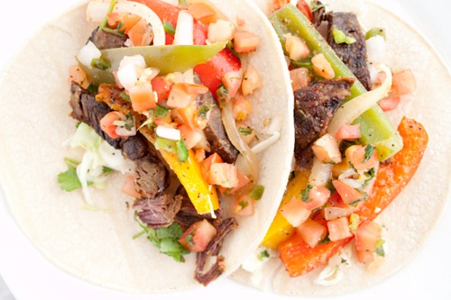 Slow Cooker Steak Fajitas Recipe - this crock pot favorite produces beef fajitas that are fall-apart tender and packed with Mexican flavor!
