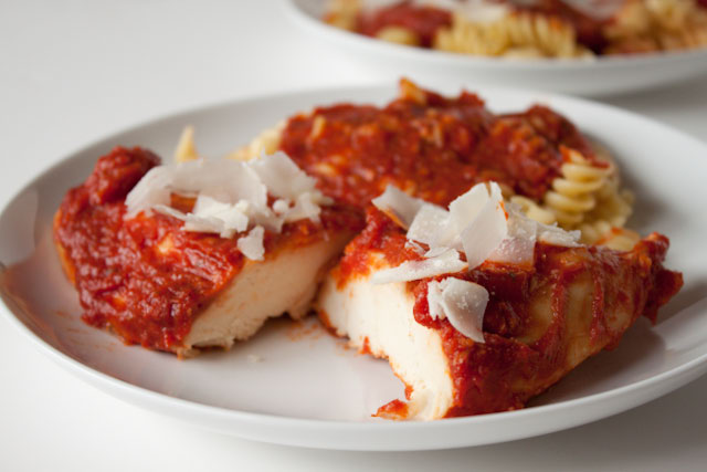 Slow Cooker - Crock Pot Italian Chicken Recipe! Comforting and easy, this crock pot chicken recipe is covered with a quick marinara and turns out tender every.single.time! Perfect for weeknight meals!