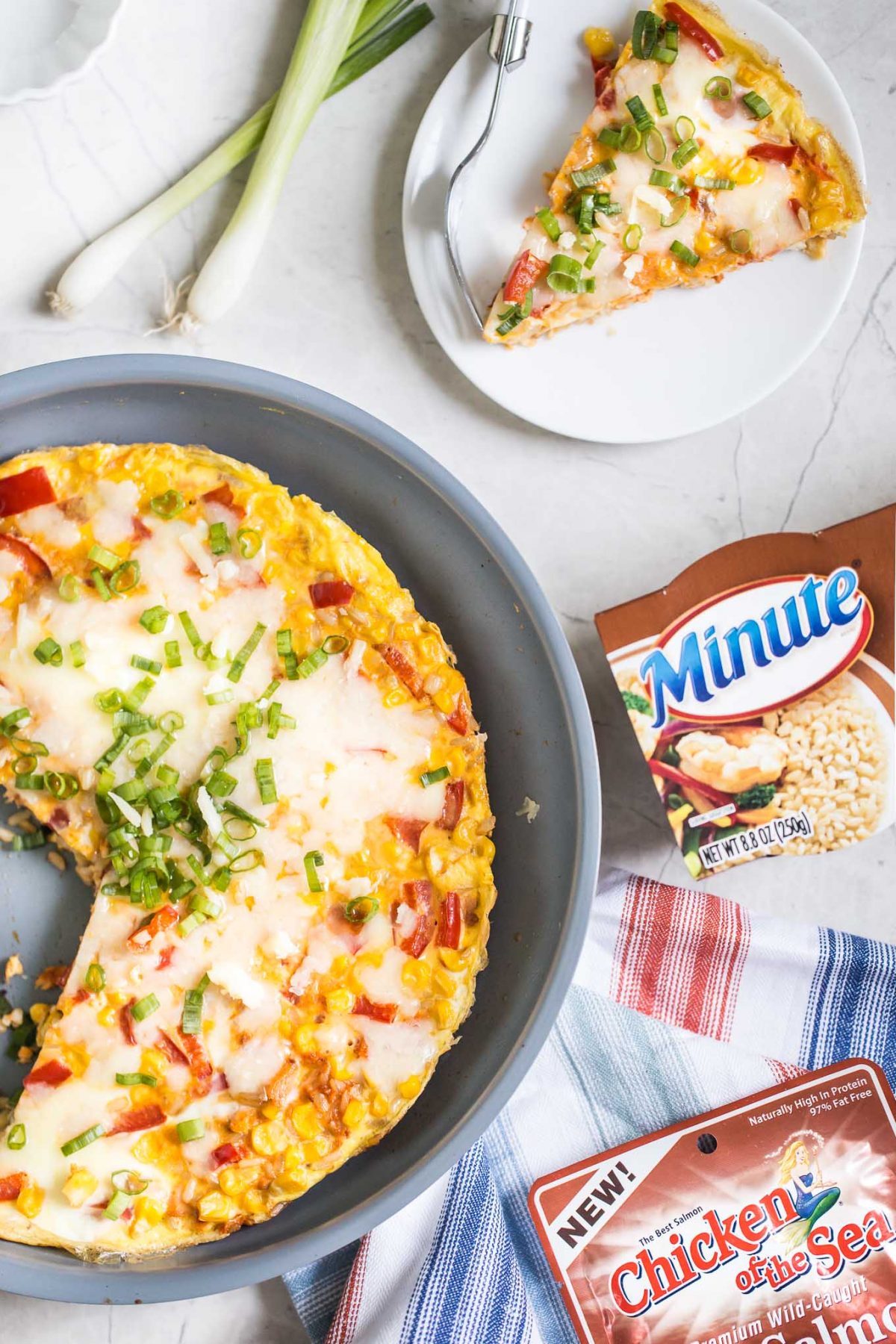 Southwestern Frittata Recipe- Here's how to make an easy breakfast egg frittata recipe with delicious southwestern flavor and plenty of texture! Features red pepper, corn, scallions and cheddar.
