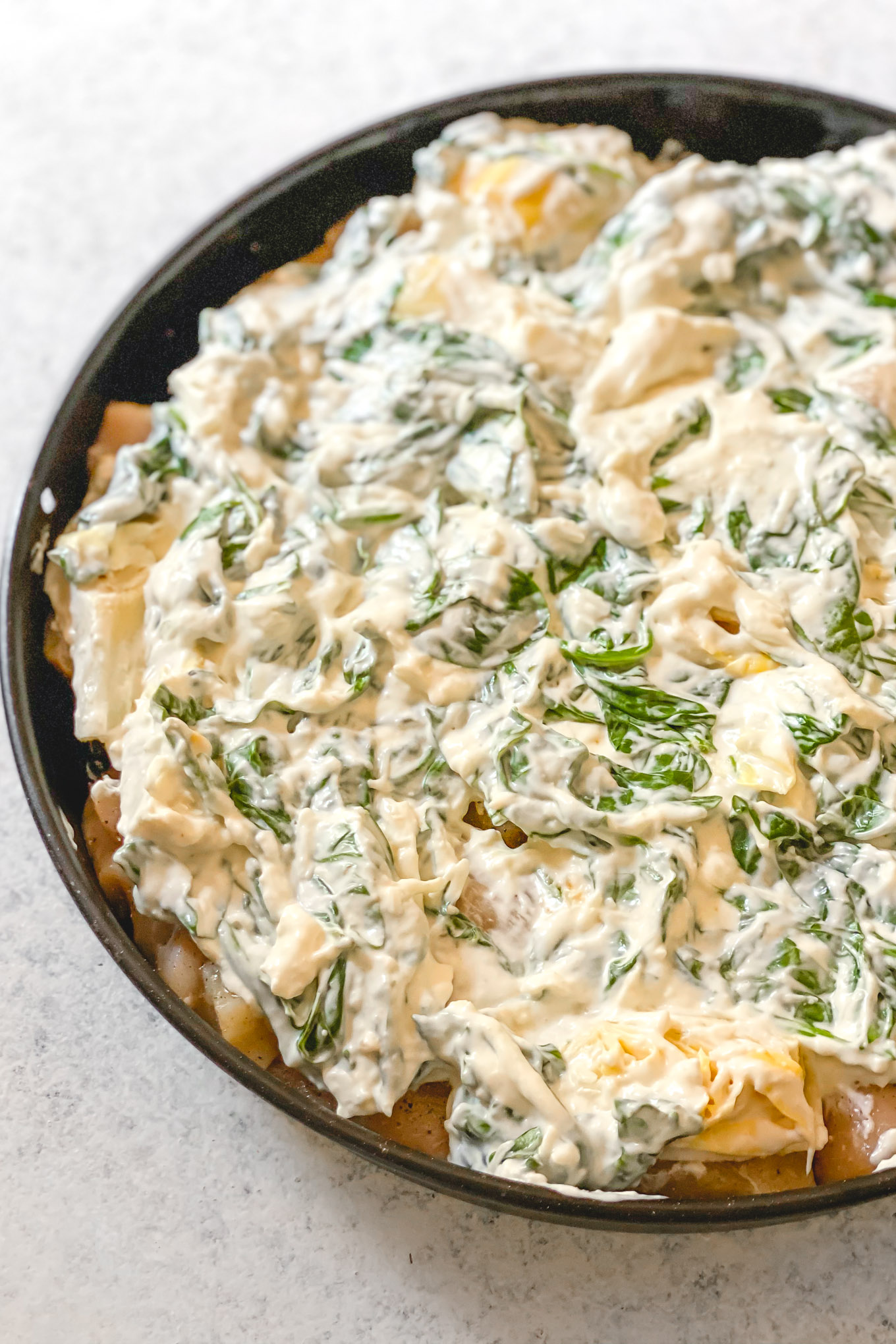 how to make baked chicken with spinach artichoke topping