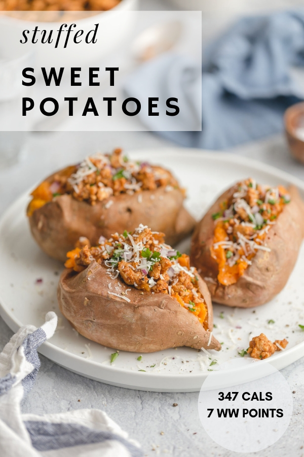 Healthy Stuffed Sweet Potatoes with Ground Turkey Taco Meat! Baked sweet potatoes filled with delicious chili- and cumin-spiced ground turkey taco meat and all your favorite taco toppings! 387 calories or 7 WW points