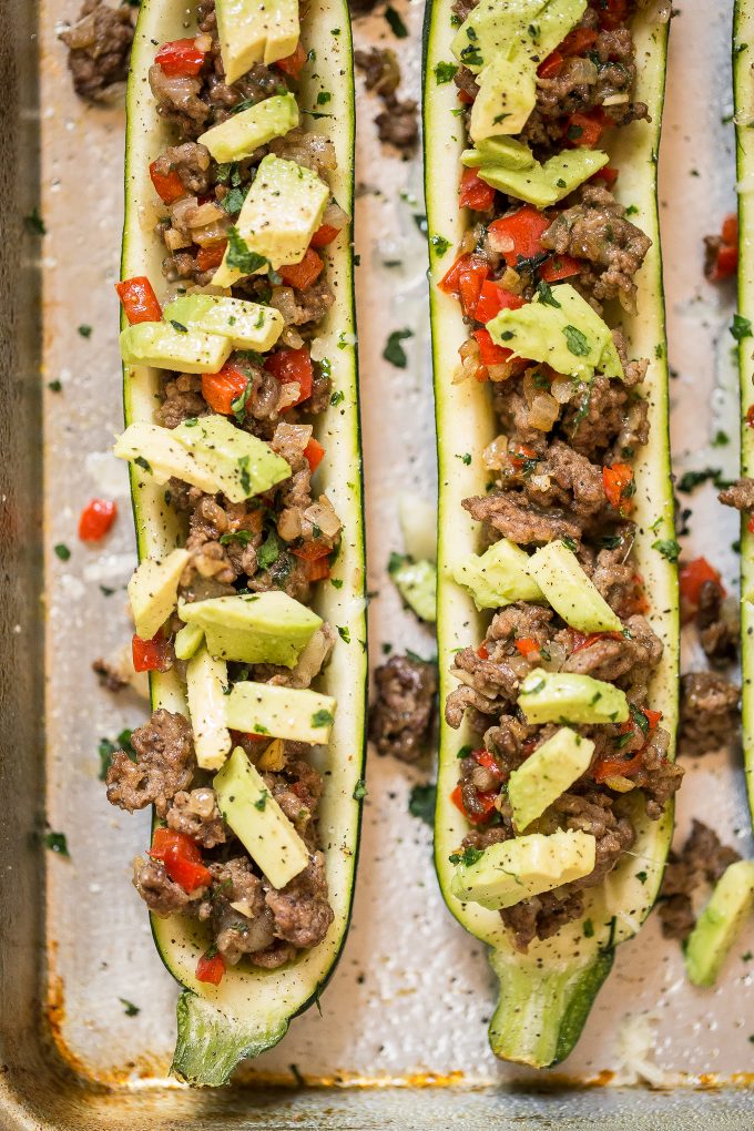Stuffed Zucchini Recipe - made with spiced ground beef and topped with avocado! 
