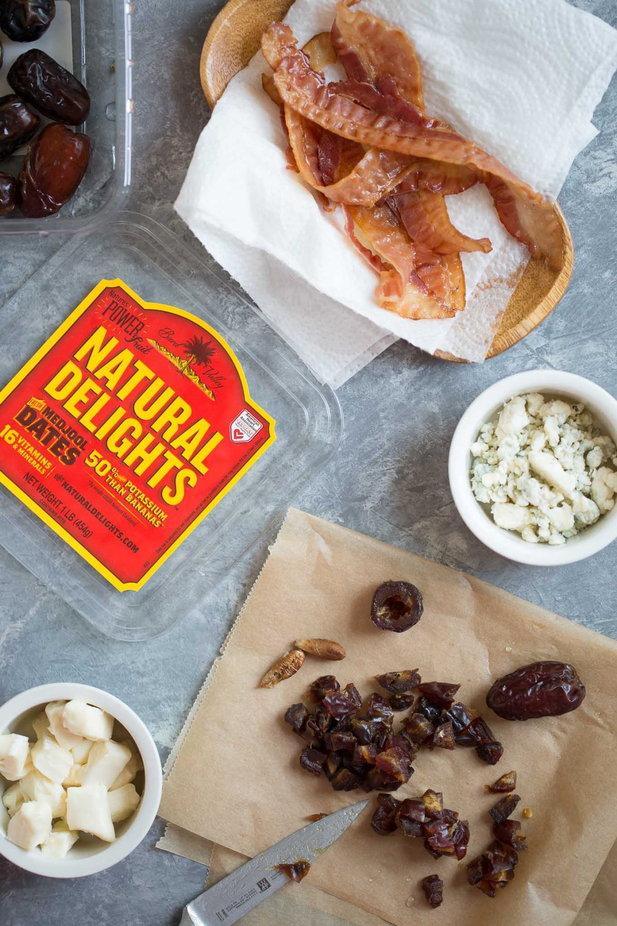 Sweet and Savory Medjool Date, Bacon, and Brie Tarts - Flaky mini fillo dough tarts make an easy, delicious appetizer - and these are perfectly sweet and savory, with brie, blue cheese, bacon, and medjool dates. 
