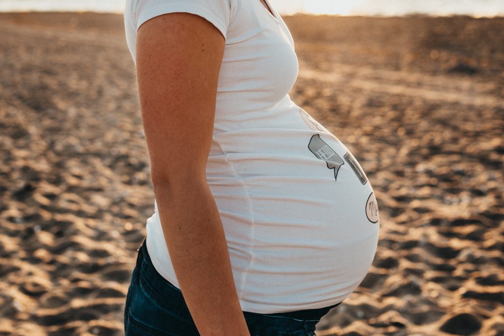 Mom-to-be on the beach