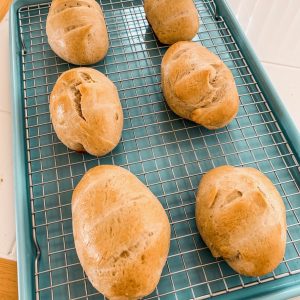 Pain Au Lait Breakfast Rolls on a Cooling Rack